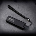 Black car-mounted USB flash drive with flexible waterproof plastic casing measuring 53.3x17.9x7.4mm