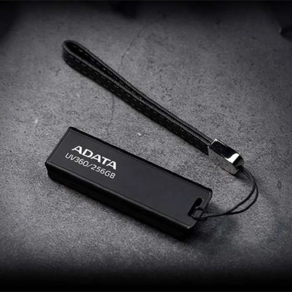Black car-mounted USB flash drive with flexible waterproof plastic casing measuring 53.3x17.9x7.4mm