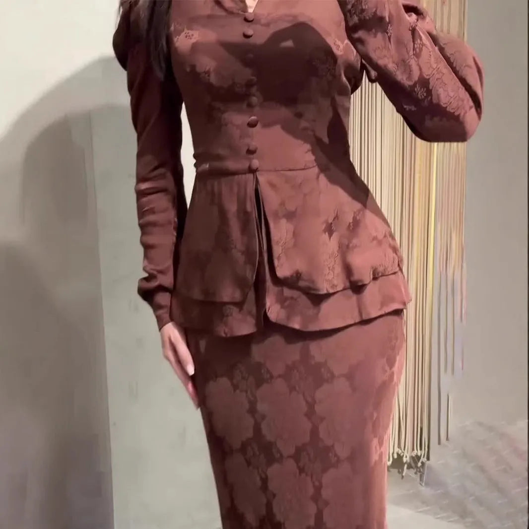 Dark brown long sleeve dress with floral pattern, button details, and a retro fake two-piece style.