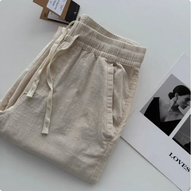 Men's loose straight-leg casual trousers in beige colour with a drawstring waistband