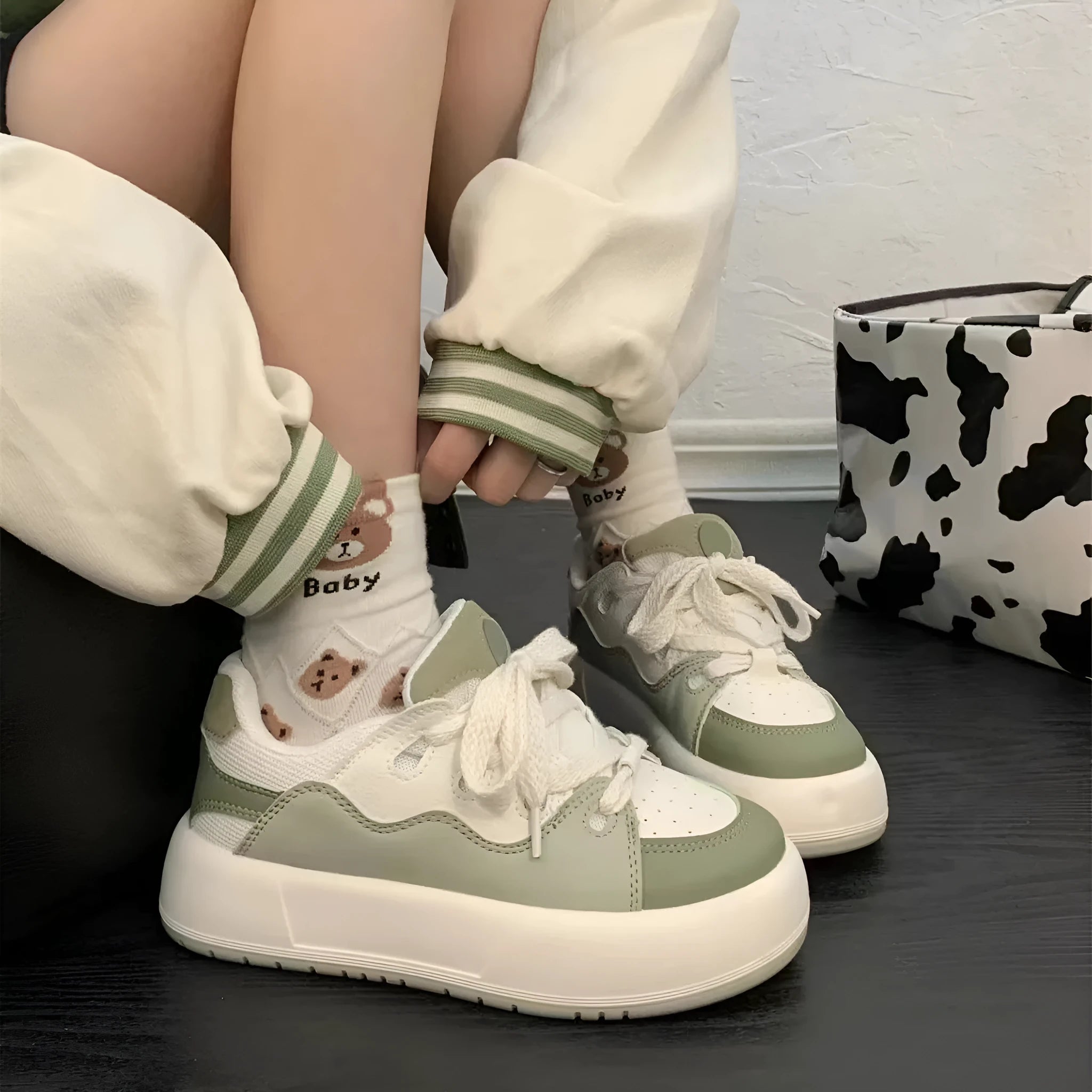 Green women's casual shoes with PU mesh upper, flat heel, and round toe design