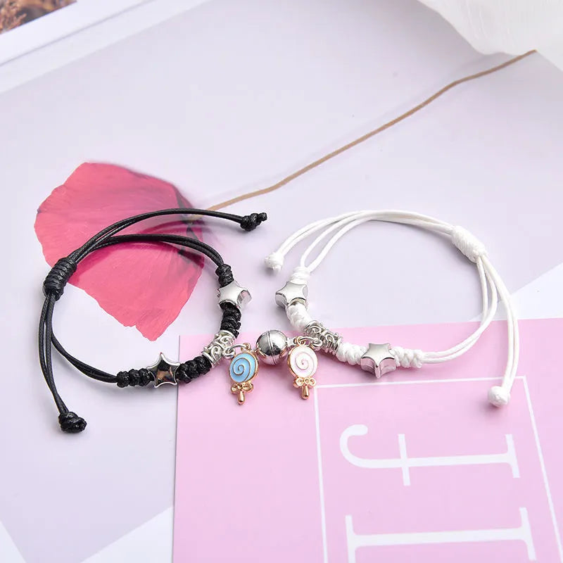 Magnetic couple bracelets with crown and diamond designs in alloy electroplated construction