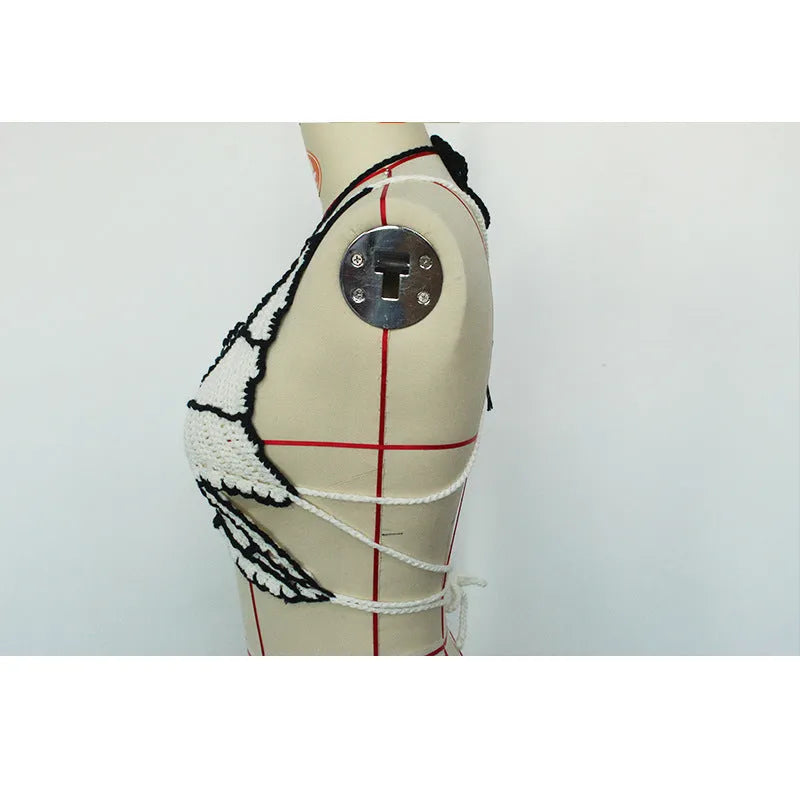 Women's black and white classic bikini swimsuit with matching top on mannequin