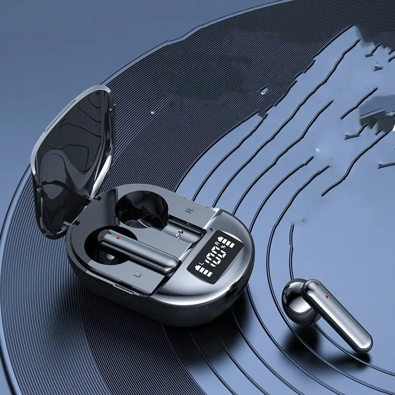 Black and white wireless Bluetooth headphones with digital display and charging case