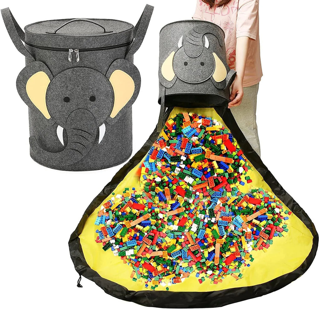 Green felt cube storage bag with a pull rope, laid flat as a play mat.