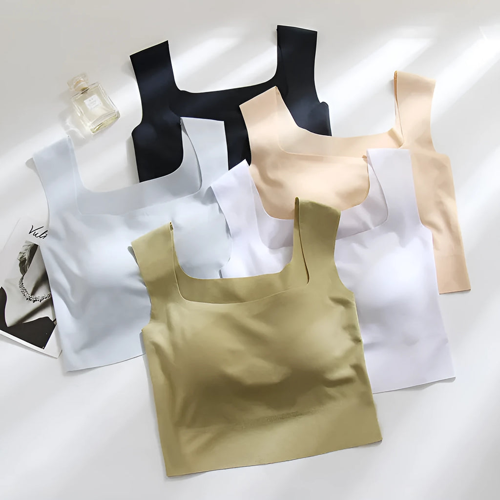 Women's non-marking nylon sling vest with chest pad in light blue, showing seamless beauty back design.