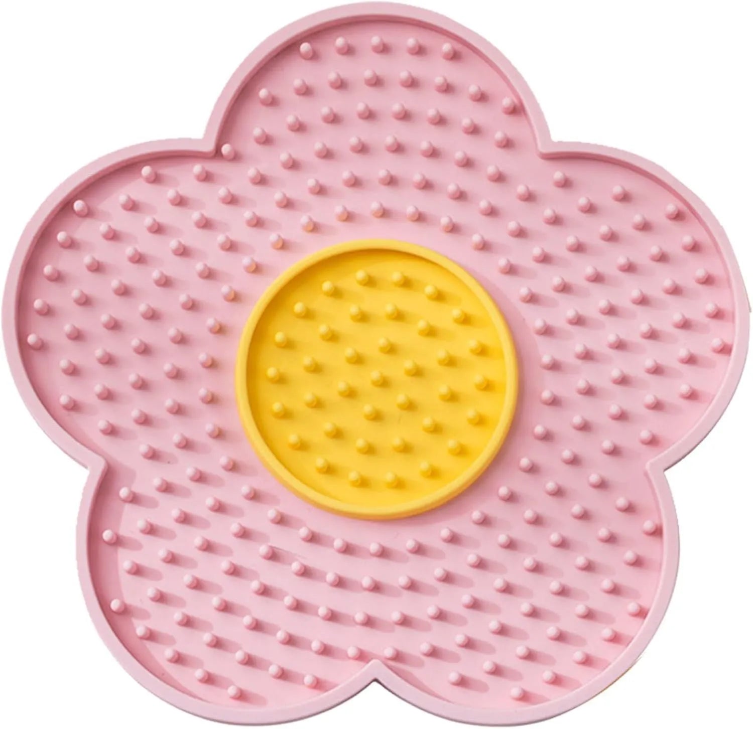 Flower-shaped blue silicone dog licking mat with suction cups on a smooth tile surface.