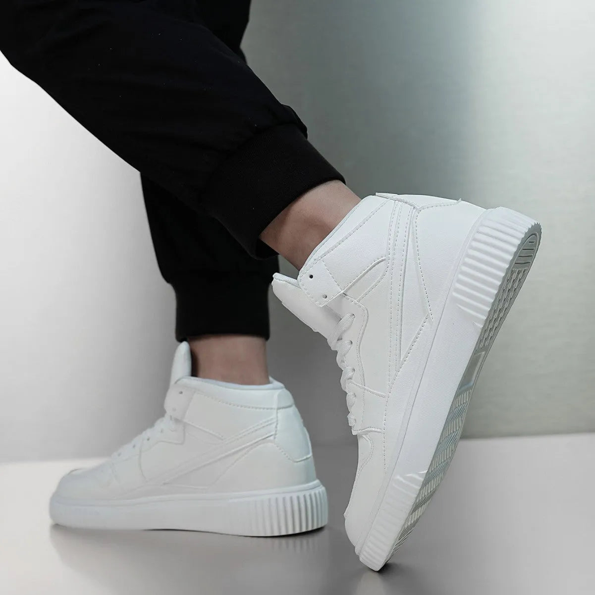 Men's white casual shoes with round toe and microfiber upper in solid color design for autumn winter leisure wear.