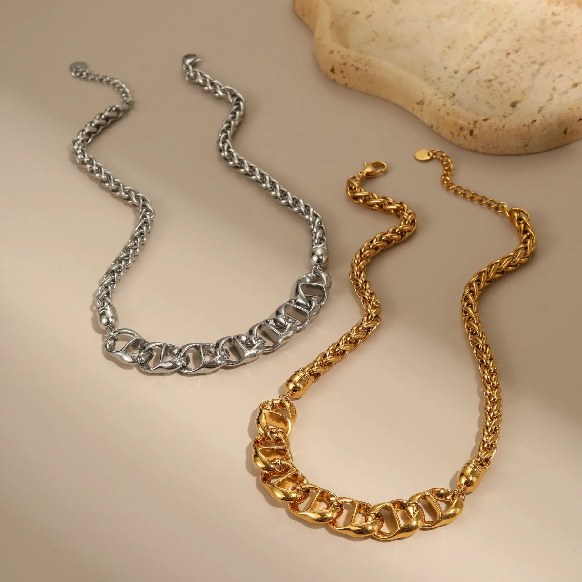 Stainless steel necklace with geometric pendant and electroplated 18K gold finish
