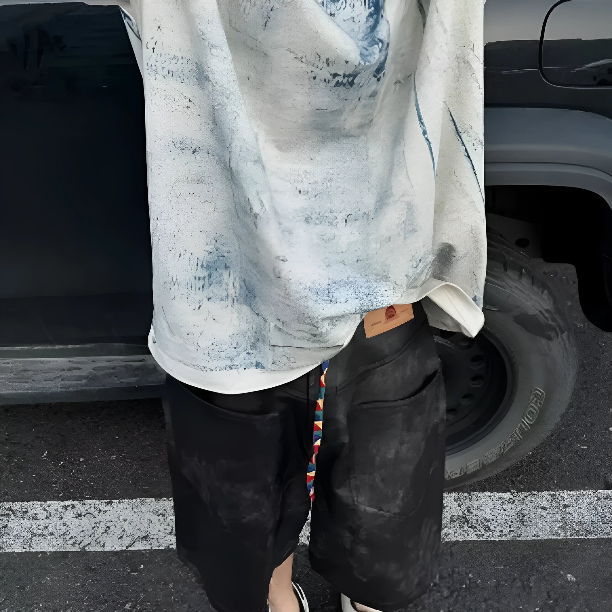 Korean-style loose fit T-shirt with head cover feature in solid colour
