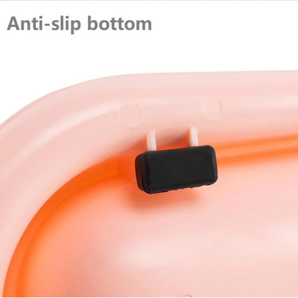 Green leakproof pet bowl set with raised feeding platform for dogs or cats.