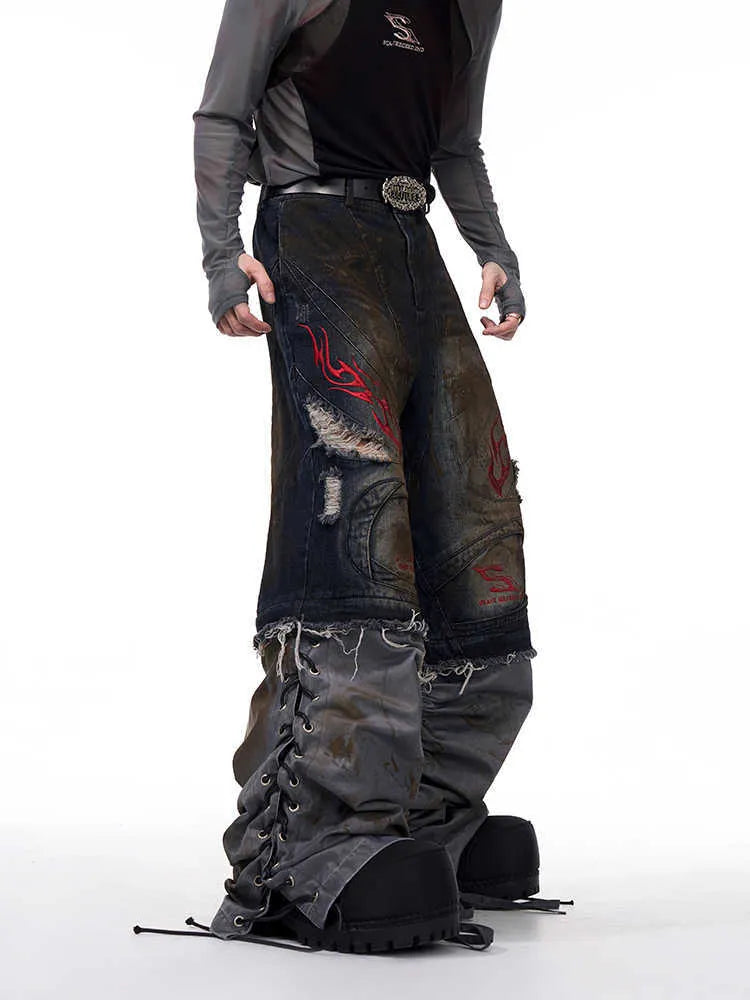 Men's retro jeans with detachable trouser legs in denim, shown in loose wide-leg fit.