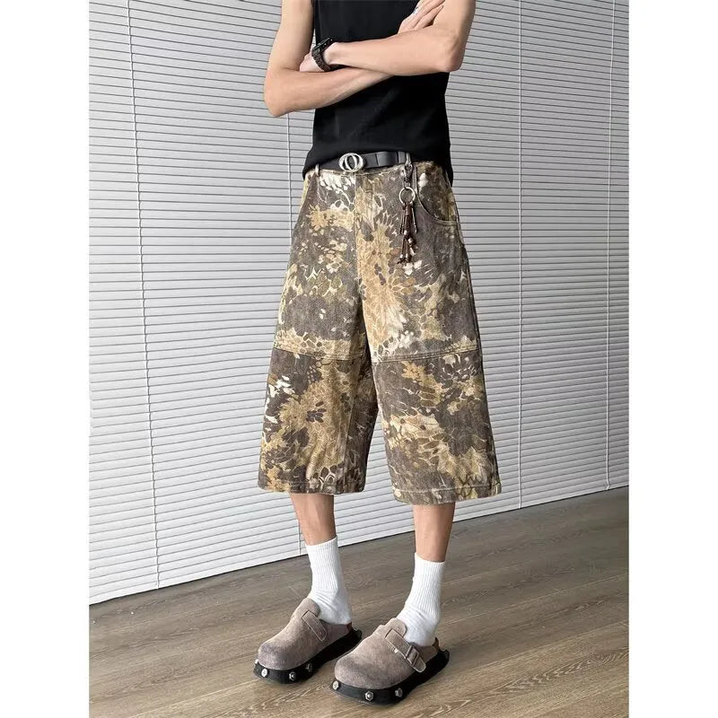 Women's yellow snake camouflage print cropped jeans on a model.