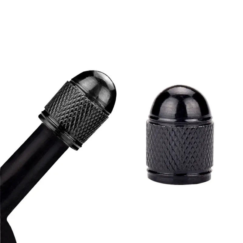 Aluminium alloy mountain bike tyre valve cap in gold, red, silver, blue, and black colours.