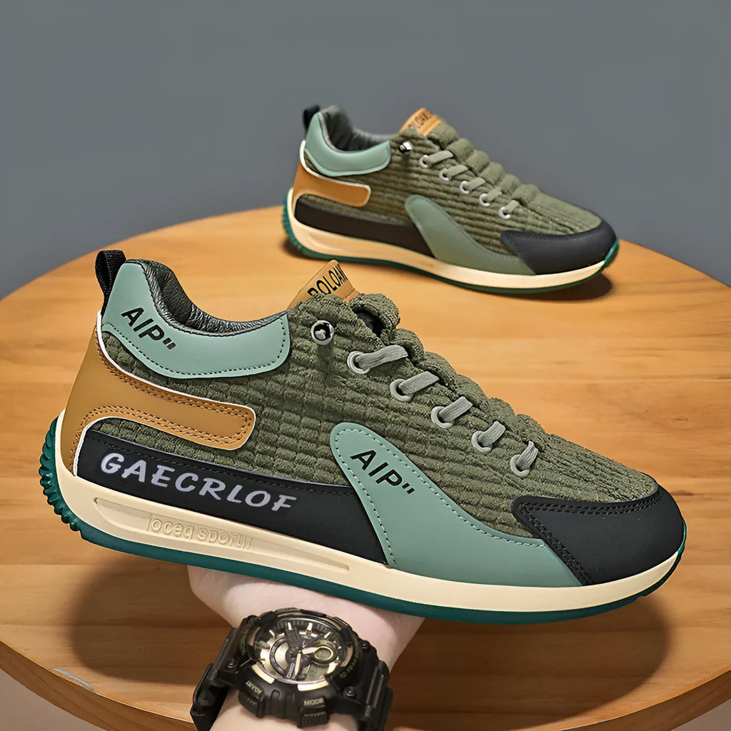 Men's green and grey lightweight mesh running shoes with lace-up front and round toe.