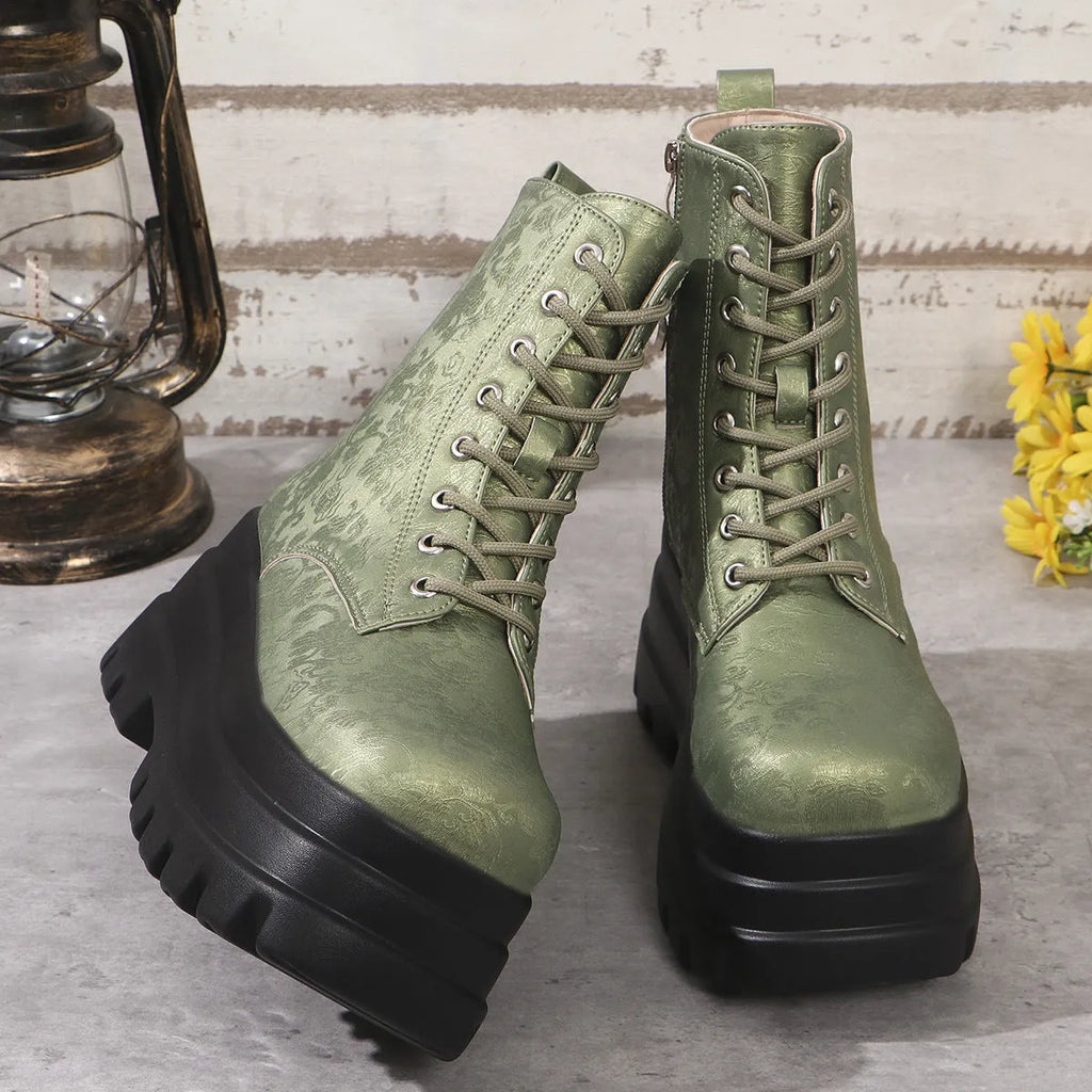 Women's black retro platform boots with patchwork round toe and side zip.