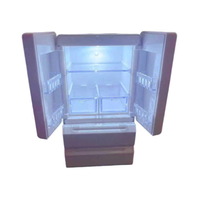 White miniature candy toy plastic model with illuminated feature on display.