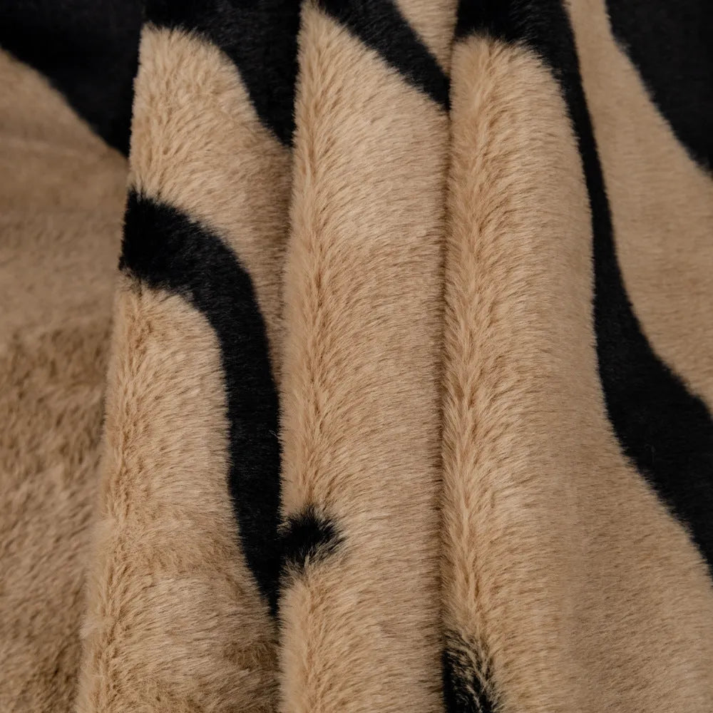 Zebra pattern non-slip flannel sofa cover with matching pillowcase in caramel colour.