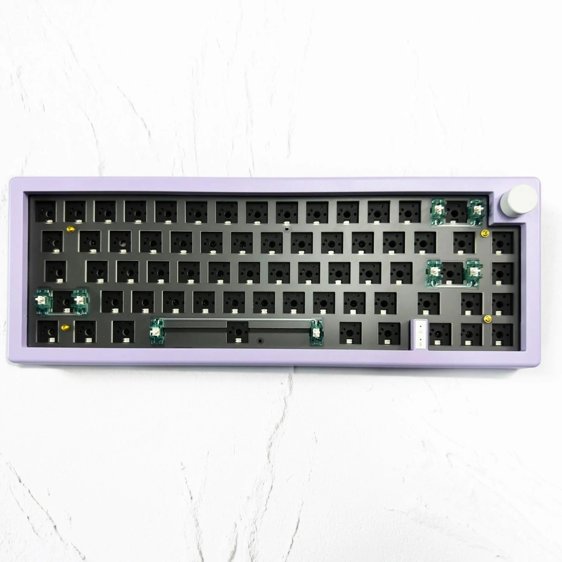 DIY mechanical keyboard kit with RGB lighting and control knob in seven colour options