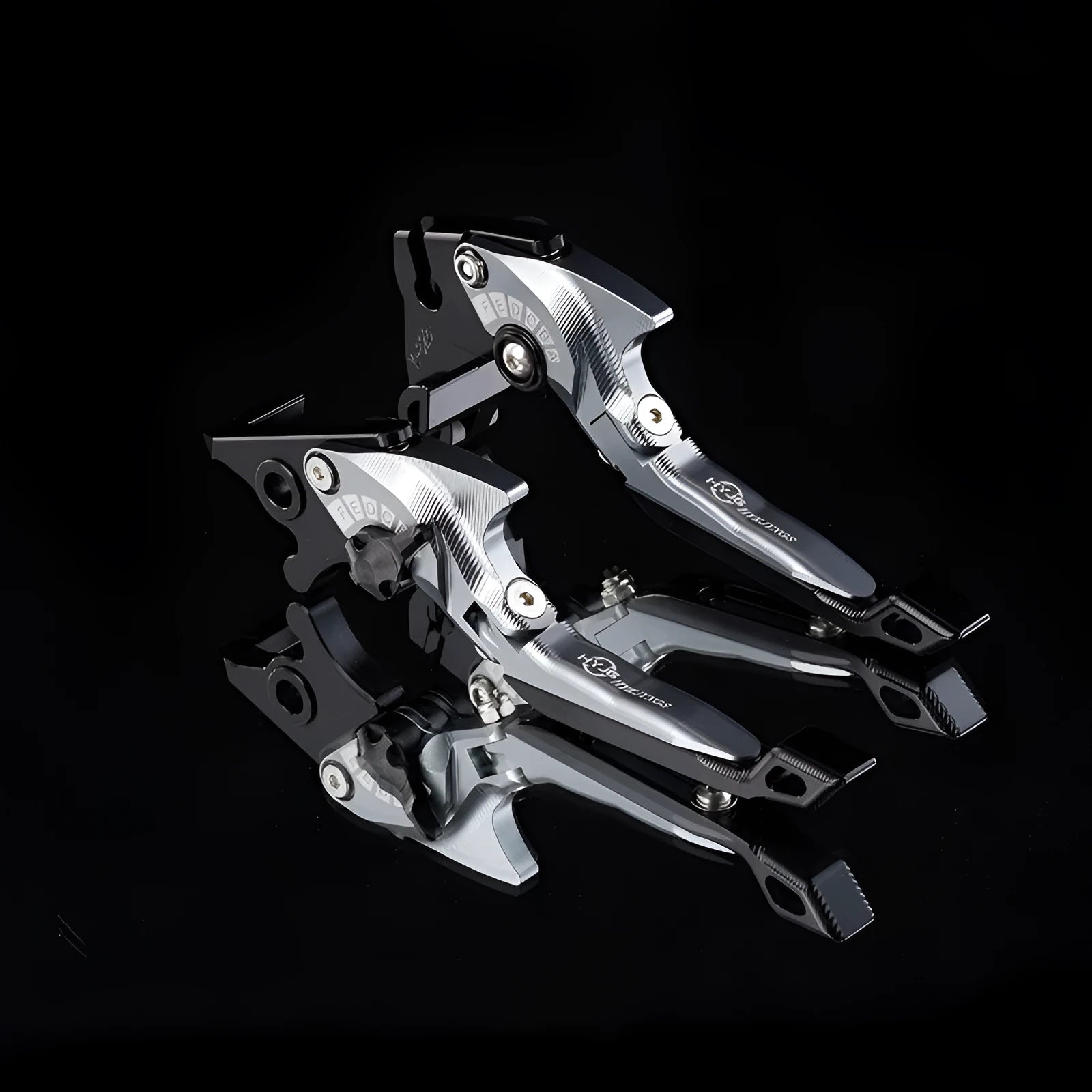 Pair of anodised metal motorcycle horn handle clutch levers with six-speed adjustable length, shown in a selection of colour finishes