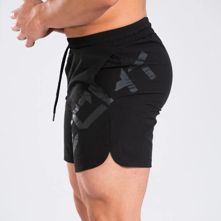 Men's black quick-dry elastic waist running shorts on a white background.