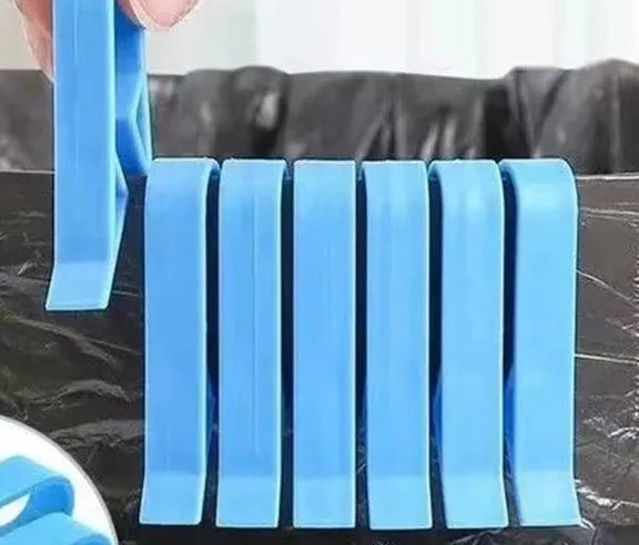 PP plastic non-slip clip for fixing a bin bag to the side of a rubbish can.