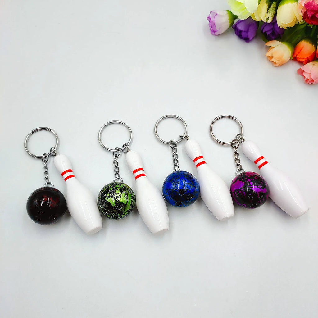 Mini simulation sports bowling keychain pendant in PVC metal on a key ring.