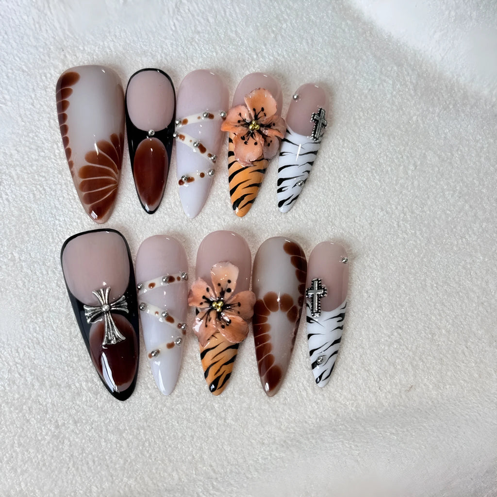 Handmade leopard print false nail stickers with cross and flower designs in sizes XS S M L