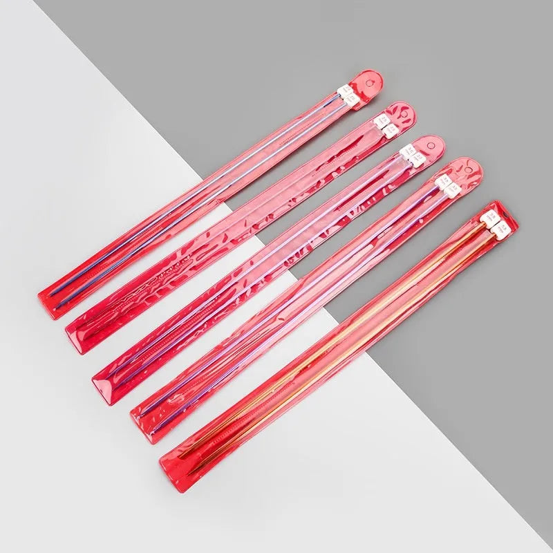 Set of lengthened crochet hooks in various sizes from 2.0mm to 10.0mm, each with a protective end cap.