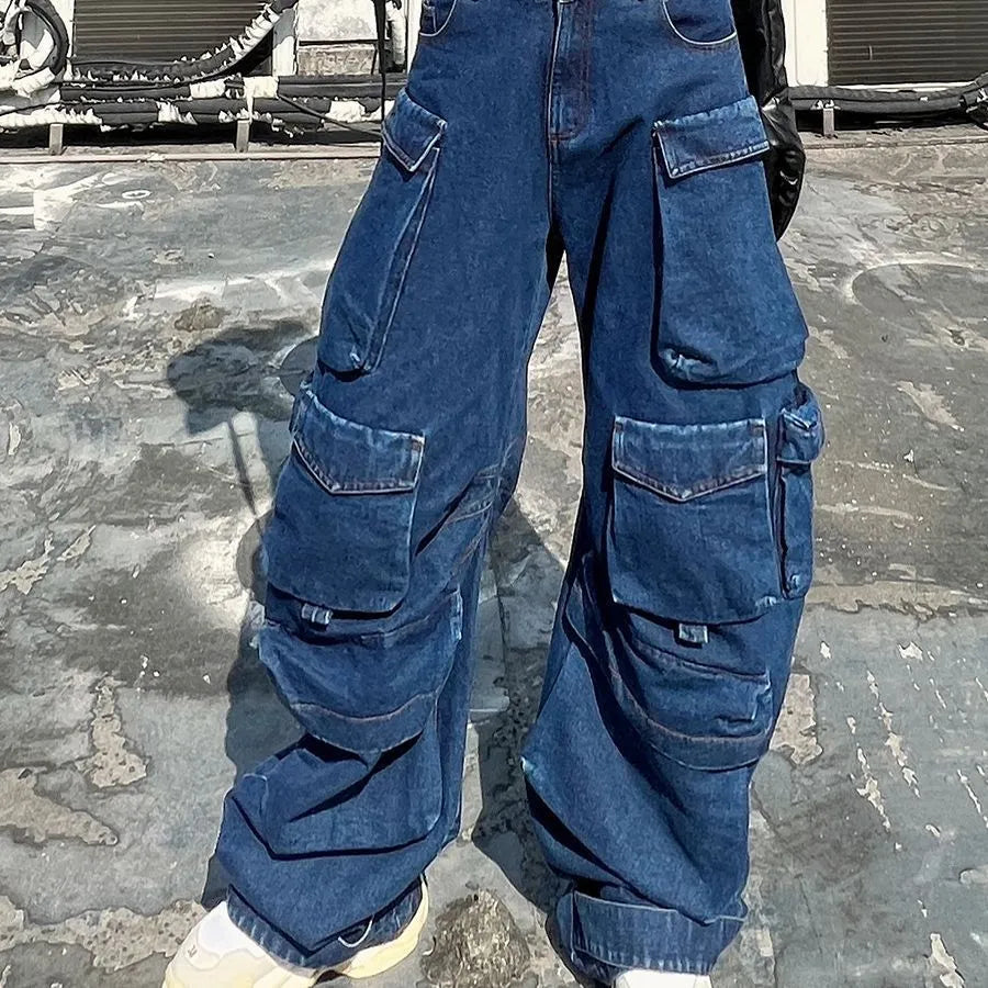 Dark blue distressed wide-leg women's jeans with high waist and multiple pockets in workwear style