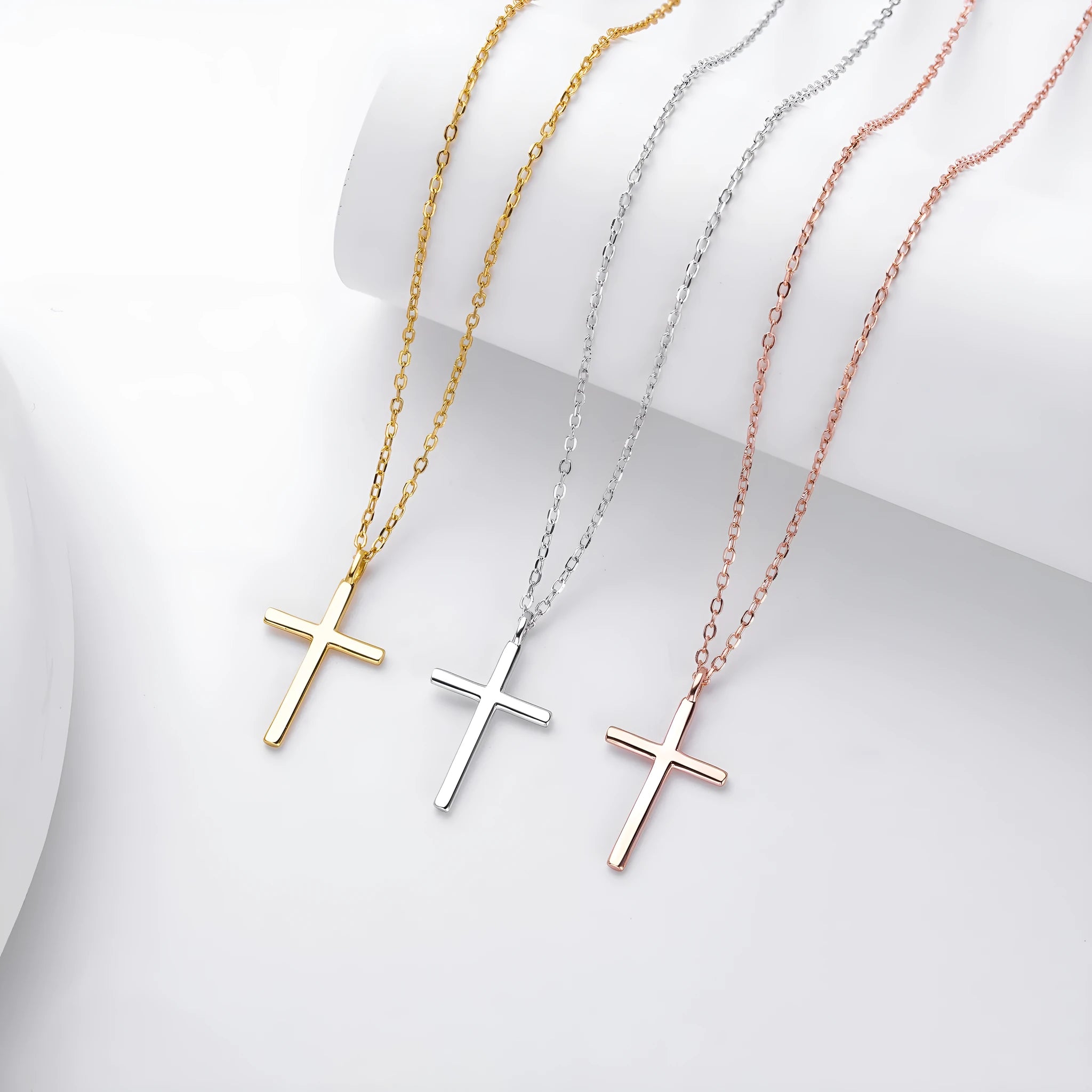 Sterling silver necklace with glossy cross pendant on O-shaped chain, adjustable length