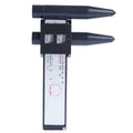 Electronic digital caliper hole distance measuring tool on a workshop bench