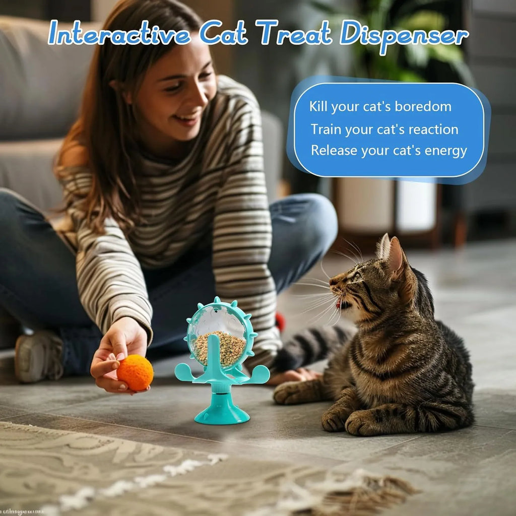 Blue interactive spinner puzzle toy for cats and dogs with suction base on a floor.