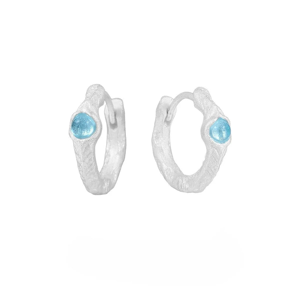 Geometric women's ear clip in burnt silver electroplated 925 silver with round design element