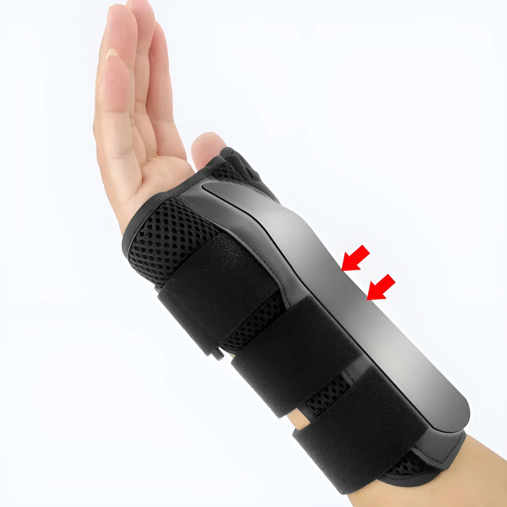 Black sports wrist guard with grey edging and a thumb strap, showing carbon fibre reinforcement panel.