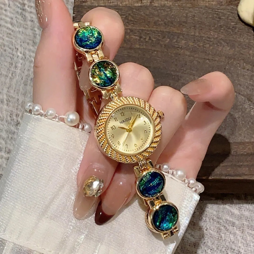 Women's quartz watch with 25mm round dial in choice of six colours including cherry powder and dark green