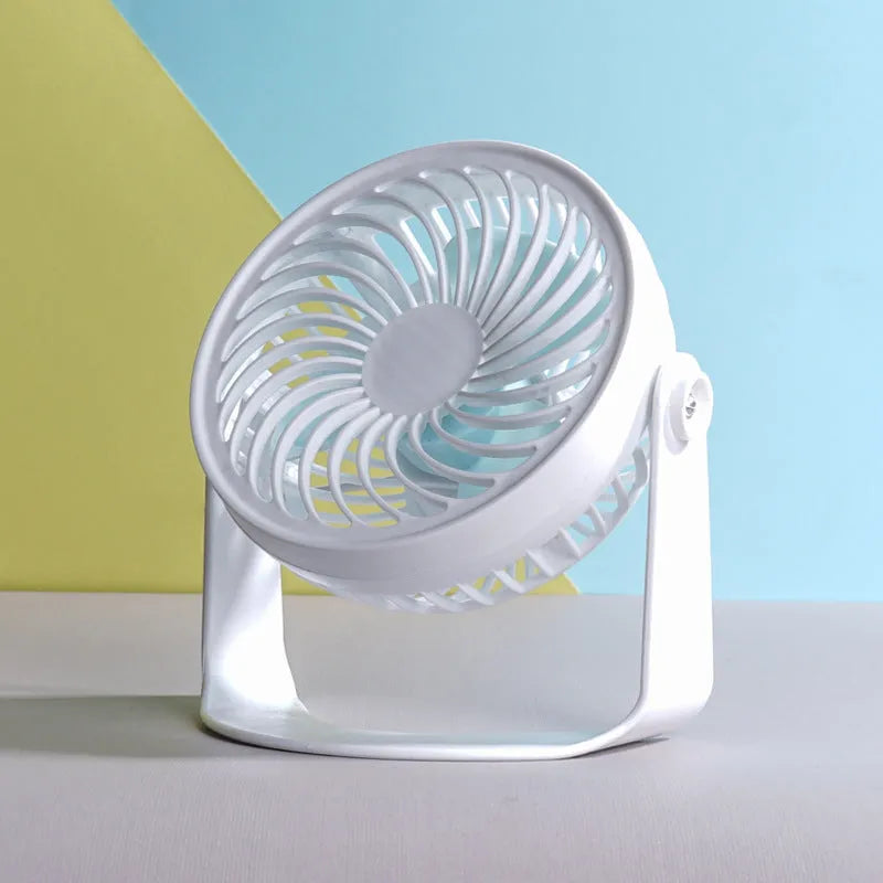 Small white USB desk fan shown in clip-on and floor-standing styles on a wooden desk.