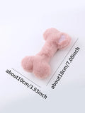 Blue plush love bone dog toy with a squeaker, shown next to pink and yellow versions.