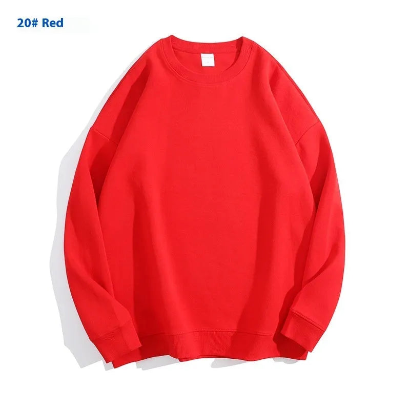 Women's loose fit cotton off shoulder sweater in a solid colour on a hanger.