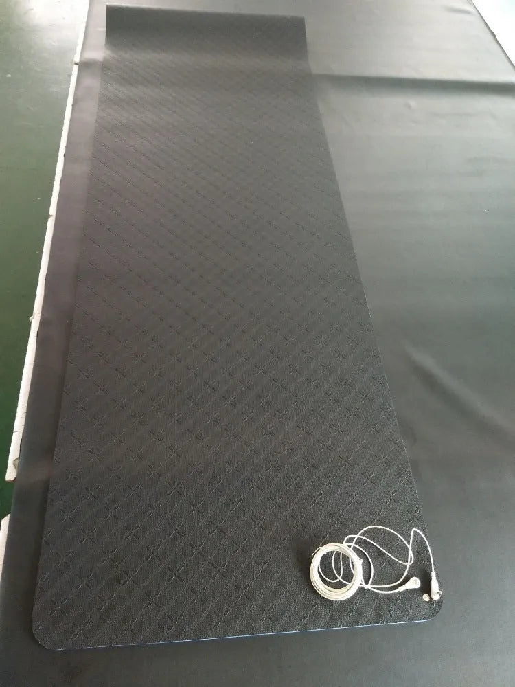 Blue conductive yoga mat with floral pattern, grounding wire, and dimensions 182x61cm.