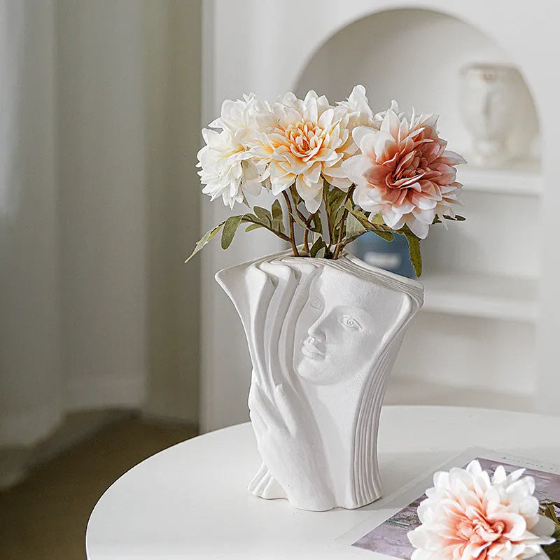 Glazed ceramic book stand in a modern design, showing one of four colour options.