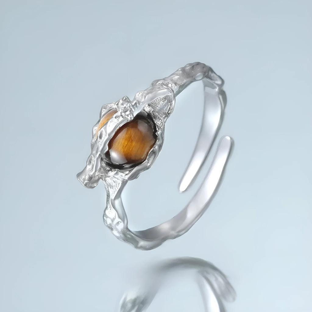 Women's adjustable open ring with Saturn design and tigereye styling in white gold electroplated silver