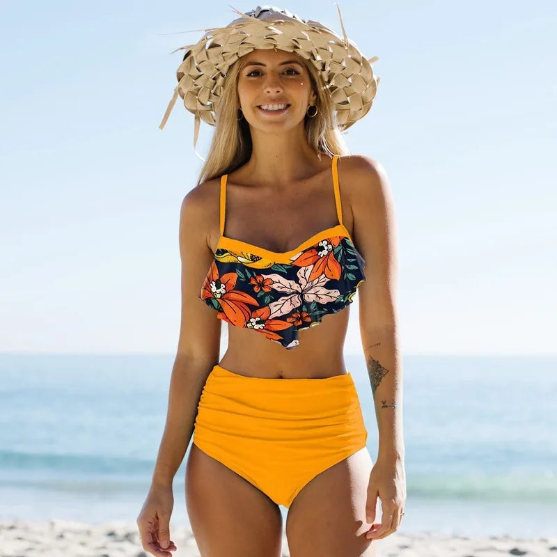 Women's green split bikini swimsuit with pleated pants and high-waist brief styling