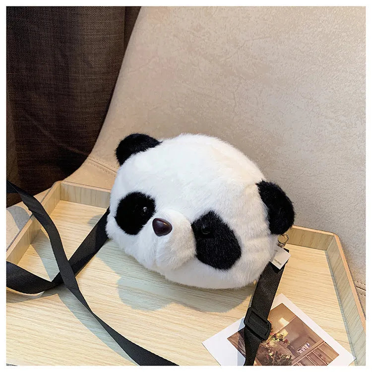 Plush panda head crossbody bag with cylindrical shape measuring 18cm wide
