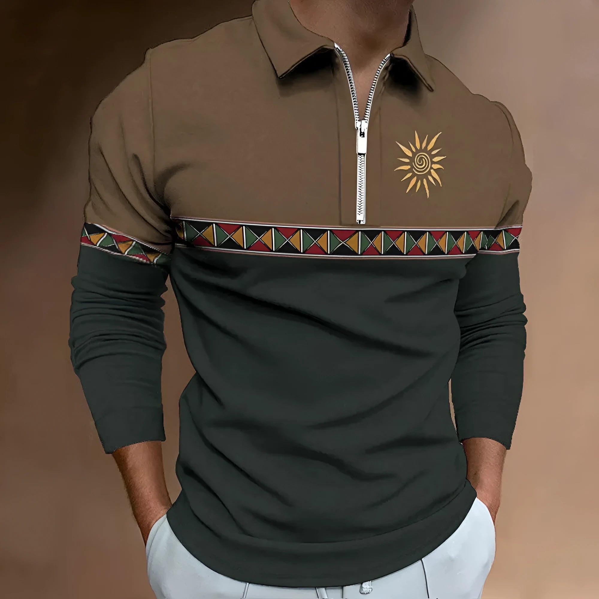 Man wearing a loose-fit, long-sleeve retro printed t-shirt with stripes and zipper decorations.