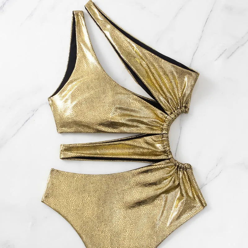 Gold backless one-piece swimsuit for women with spandex construction in S, M, L sizes