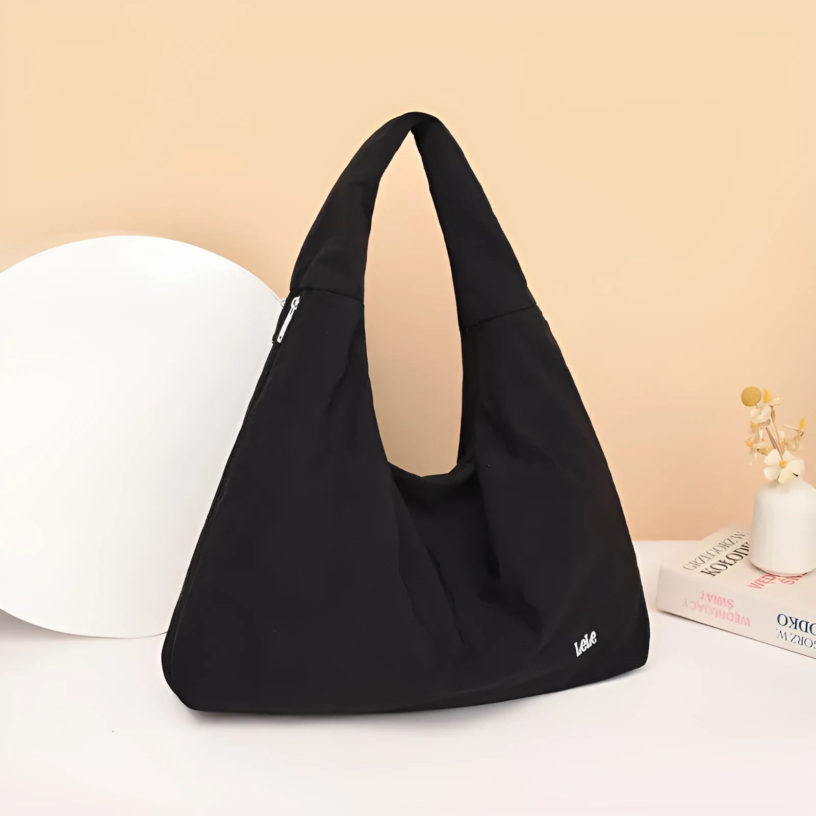 Heart-shaped soft nylon crossbody bag for women in black, blue, khaki, or yellow.