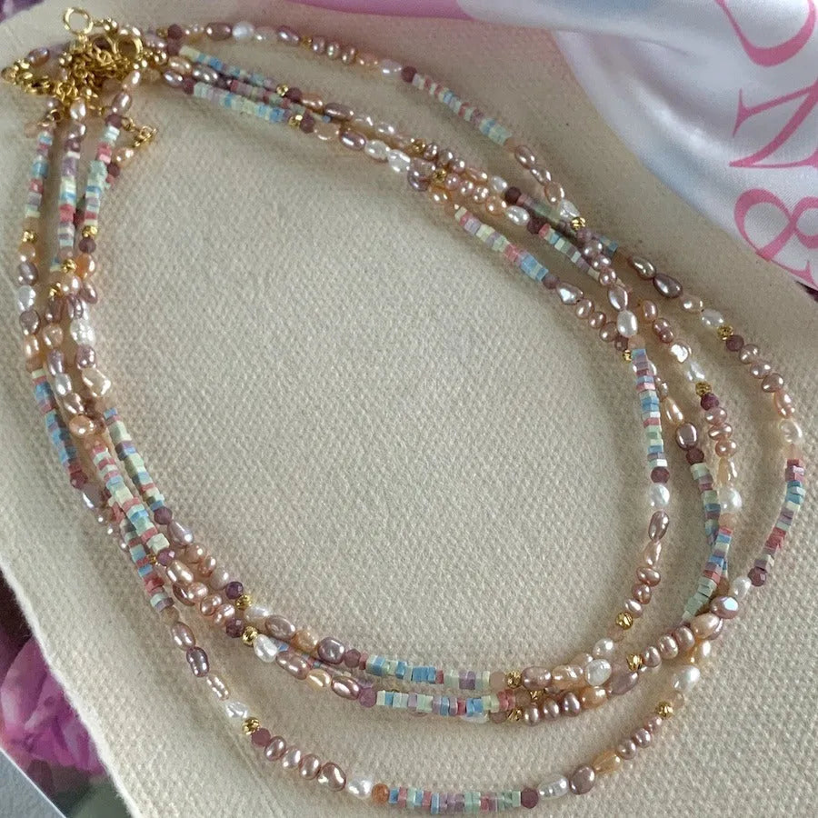 Natural pearl bracelet and necklace set with purple silver beads and 14K gilded accents in irregular U-shaped design