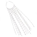 Gold and silver rhinestone mesh headband with a decorative tassel accessory.