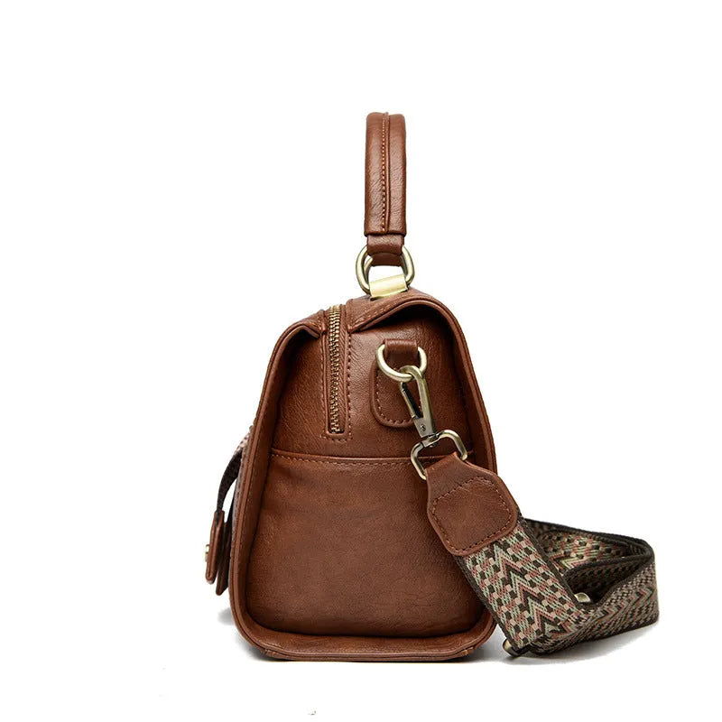 Women's grey PU leather one-shoulder crossbody bag with a square shape and outer pocket